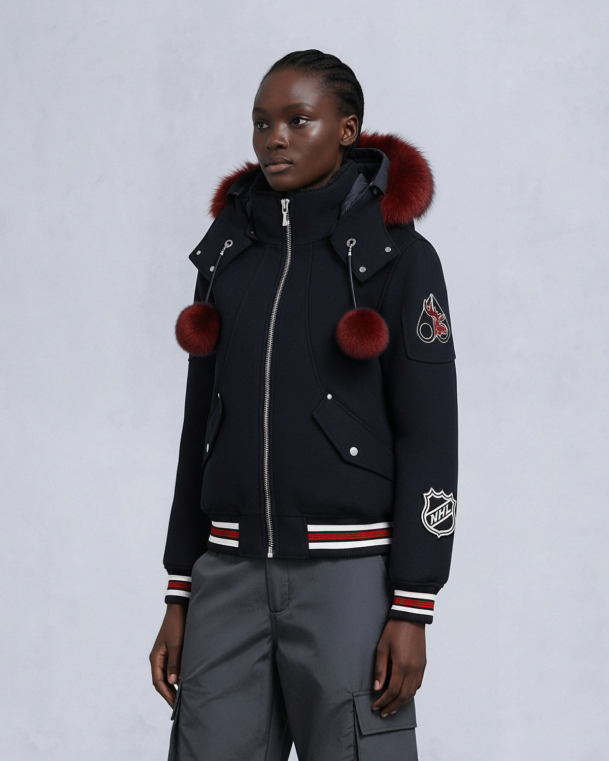 NHL X MOOSE KNUCKLES TEAM BOMBER JACKET-BLACK/SUMAC/BONE