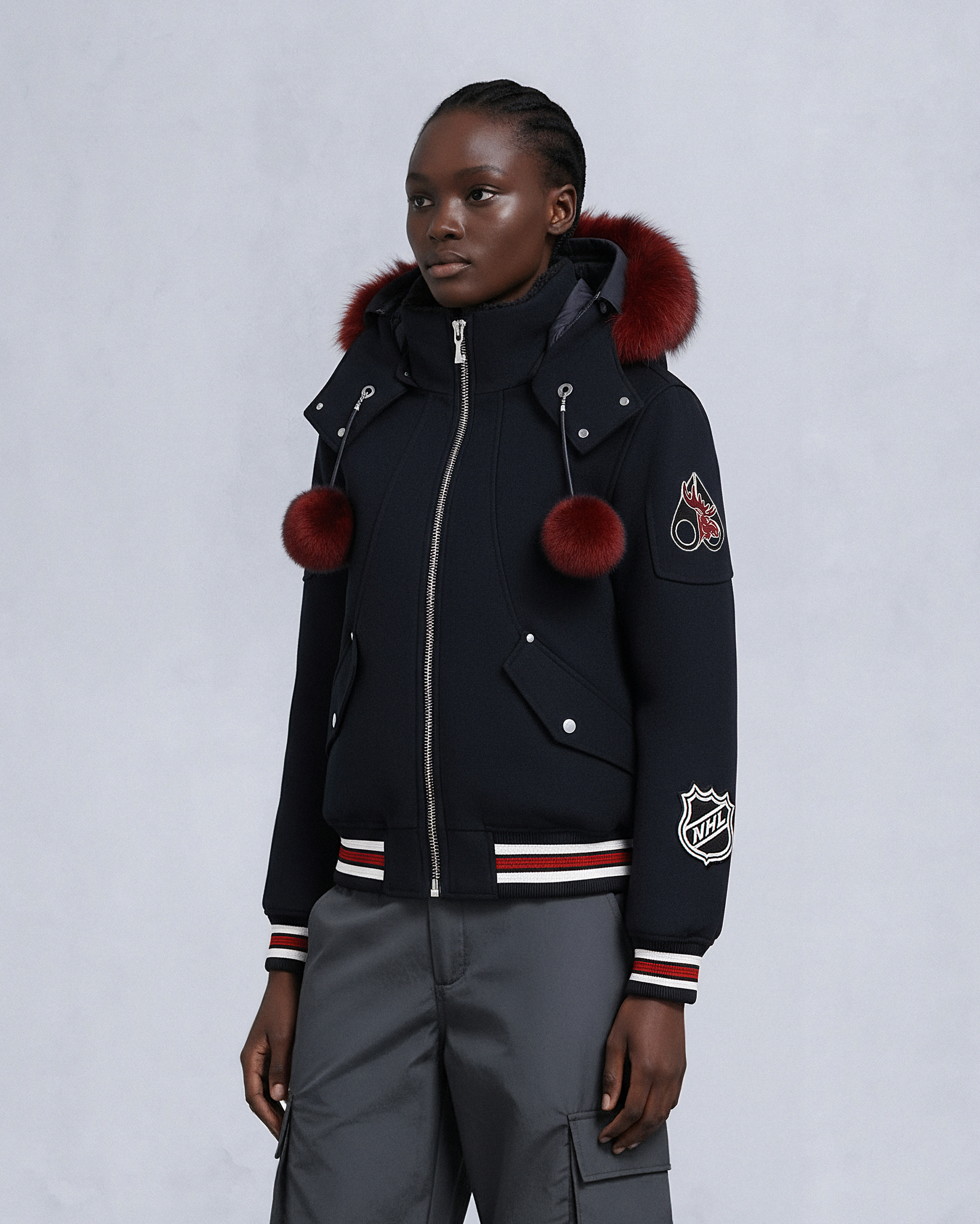 NHL X MOOSE KNUCKLES TEAM BOMBER JACKET-BLACK/SUMAC/BONE