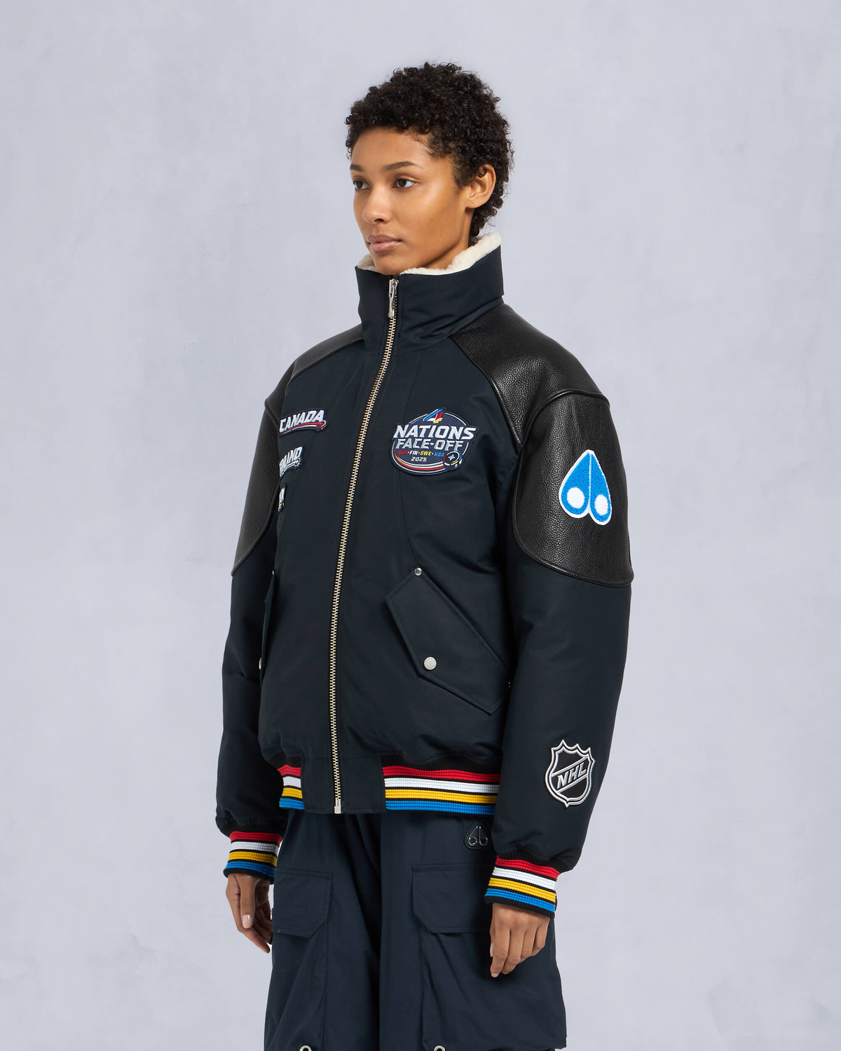 Moose Knuckles Mens MOOSE KNUCKLES x NHL 4 NATIONS FACE-OFF BOMBER JACKET NAVY FN M35MB030FN Front